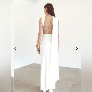 Kadriana 2 piece ivory set size small, new with tags.